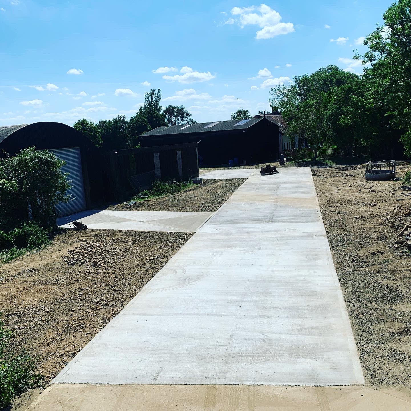 Concrete hardstanding and access roadway laid across a Norfolk farmyard