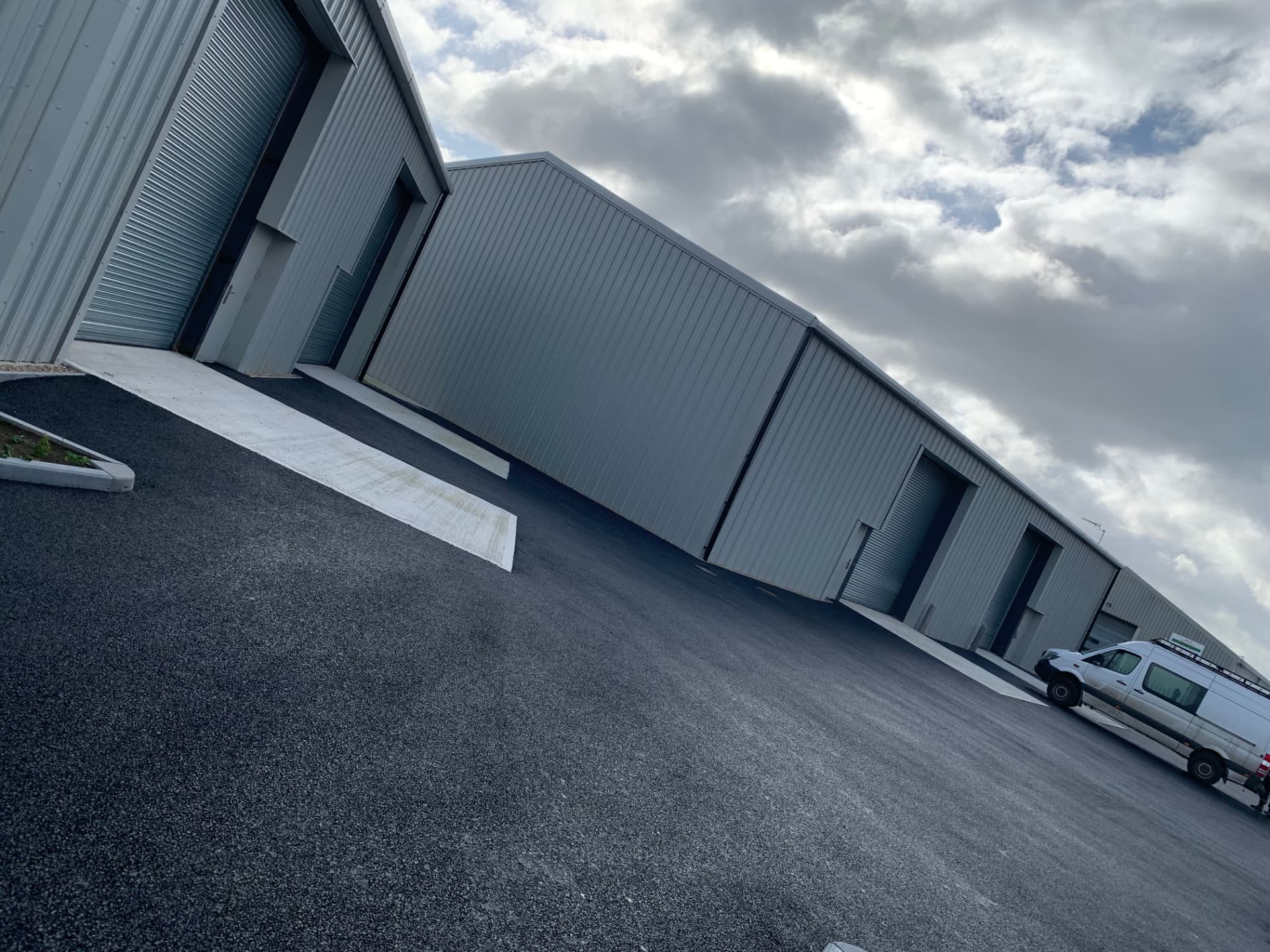 Completed commercial and industrial units with cladding and concrete aprons